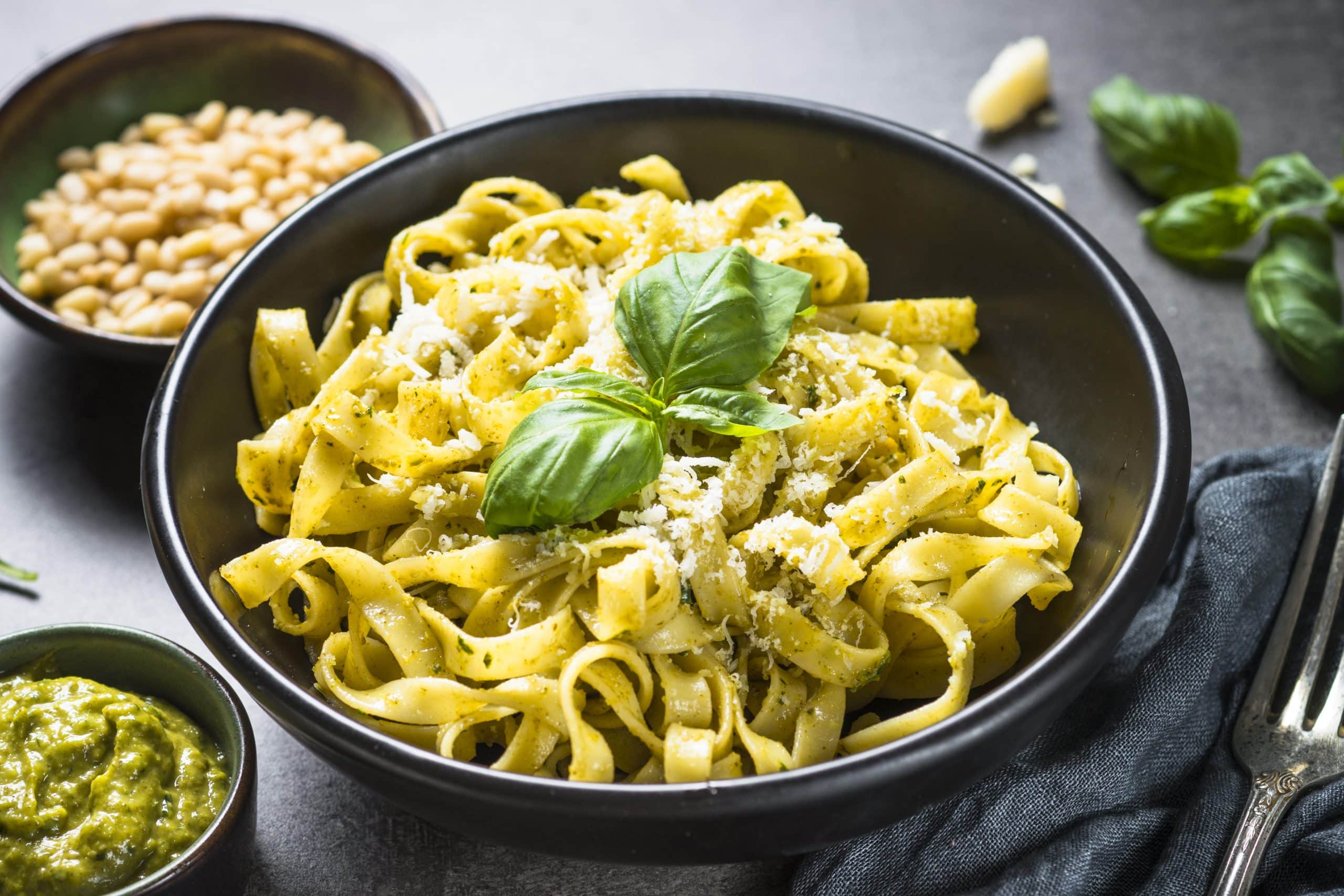 tagliatelle pasta with pesto sauce and parmesan 2021 08 26 18 06 52 utc scaled